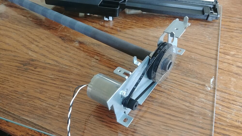 Motor attached to a belt